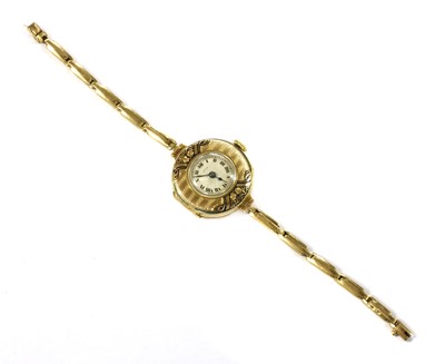 Lot 435 - A gold Juco mechanical bracelet watch