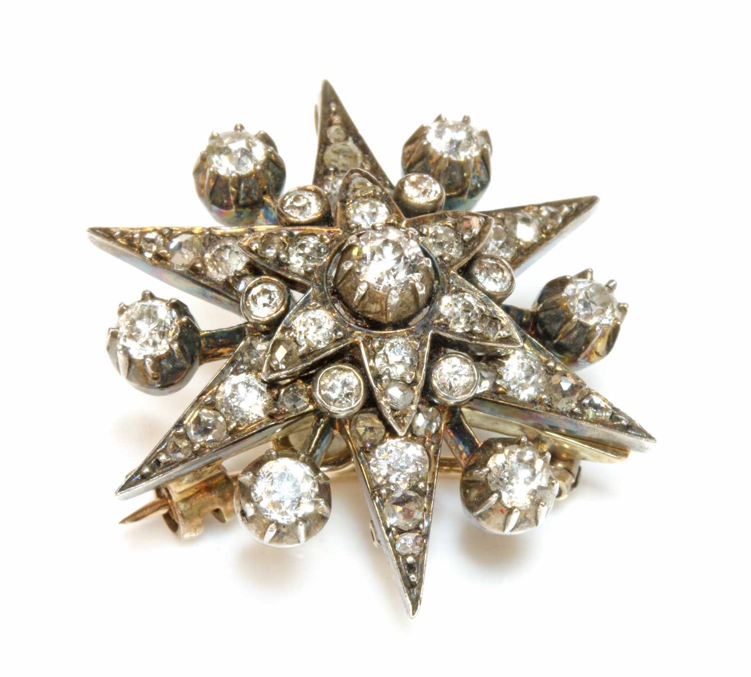 Lot 60 - A Victorian diamond set star brooch, c.1890