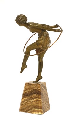 Lot 237 - An Art Deco gilt figure of a hoop dancer