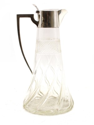Lot 273 - An Edwardian cut glass and silver marked claret jug