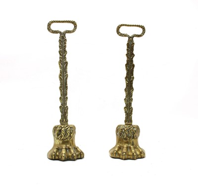 Lot 372 - A pair of 19th century brass lion's paw doorstops