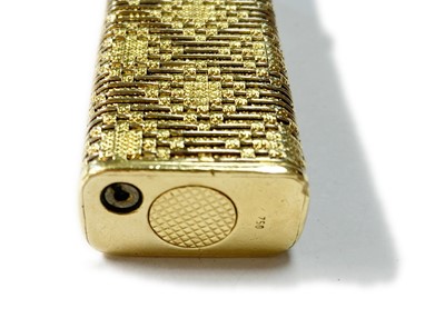 Lot 333 - A gold Dunhill lighter