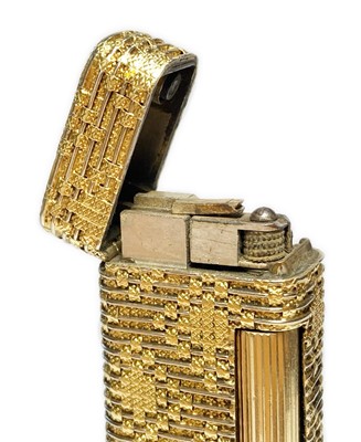 Lot 333 - A gold Dunhill lighter