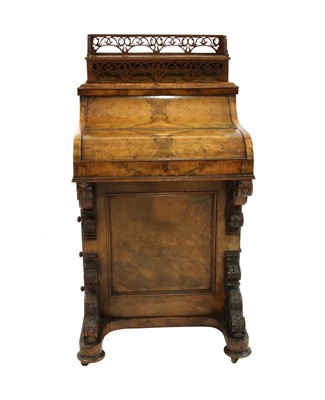 Lot 664 - A Victorian walnut Davenport