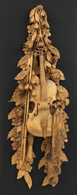 Lot 951a - A carved wall hanging in the style of Grinling Gibbons