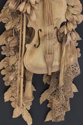 Lot 951 - A carved wall hanging in the style of Grinling Gibbons