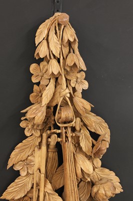 Lot 951 - A carved wall hanging in the style of Grinling Gibbons