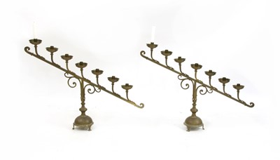 Lot 111 - A pair of brass church altar candlesticks