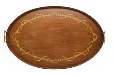 Lot 457 - An Edwardian fiddle cut mahogany oval tea tray