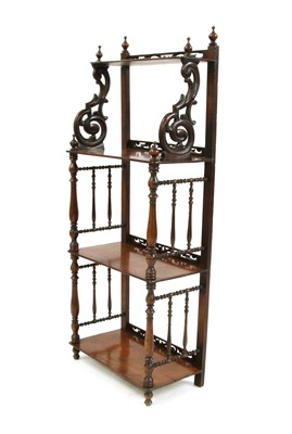 Lot 724 - A mahogany four tier whatnot