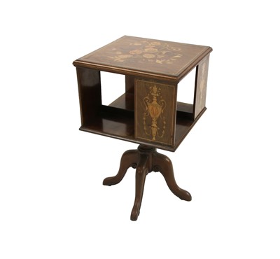 Lot 678 - An Edwardian mahogany inlaid revolving book table