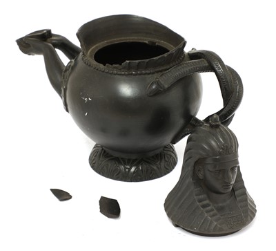 Lot 870 - A Regency black basalt teapot