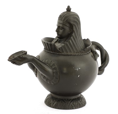 Lot 870 - A Regency black basalt teapot