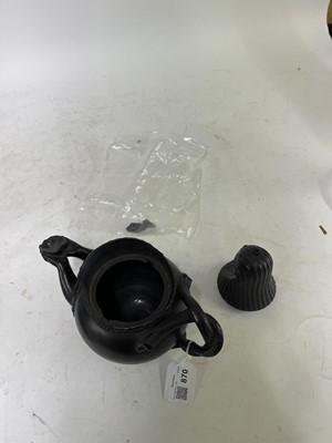 Lot 870 - A Regency black basalt teapot