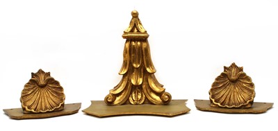 Lot 404 - A pair of giltwood shell form wall brackets