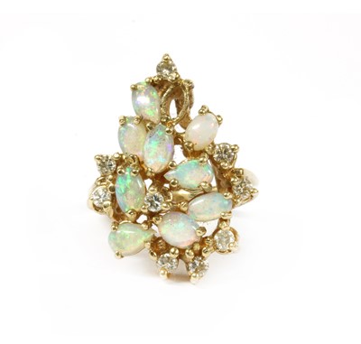 Lot 147 - A gold opal and diamond cluster ring