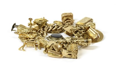 Lot 129 - A 9ct gold charm bracelet