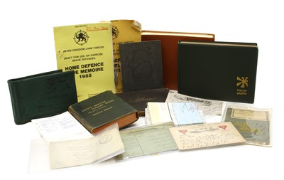 Lot 99J - Military interest, a small box with 4 albums containing photographs of campaigns