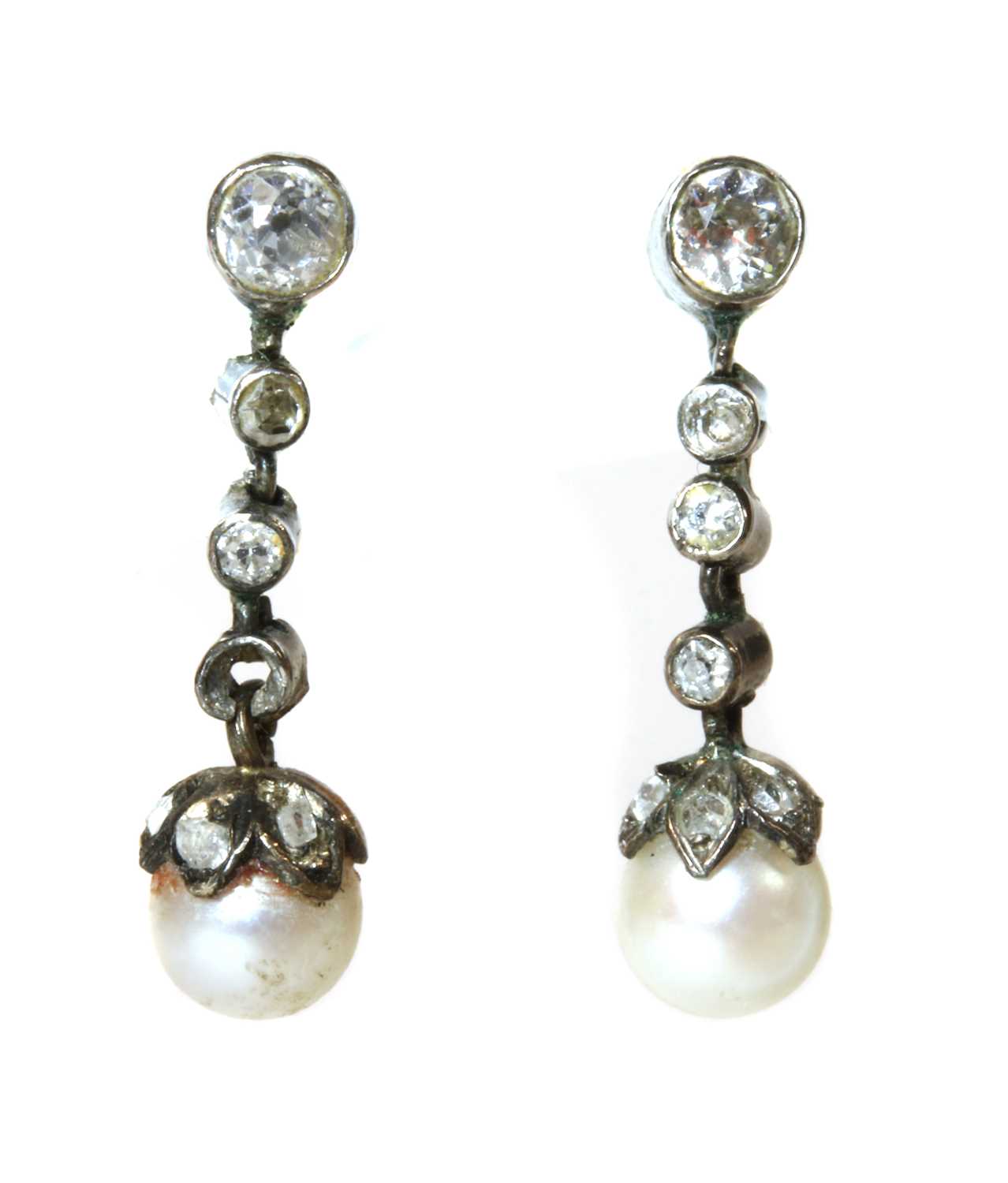 Lot 140 - A cased pair of early 20th century pearl and diamond drop earrings