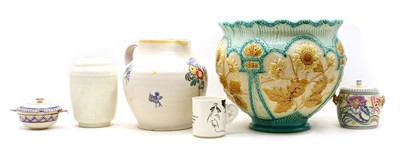 Lot 412 - A collection of Poole Pottery comprising of a jug with flowerhead detail