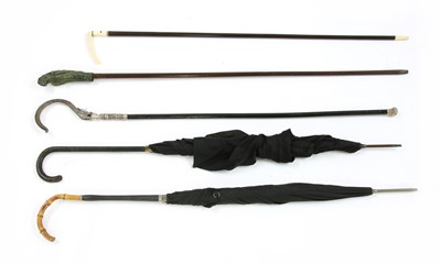 Lot 509 - An ebonised walking cane