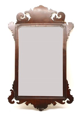 Lot 566 - A George II fret carved mahogany wall mirror