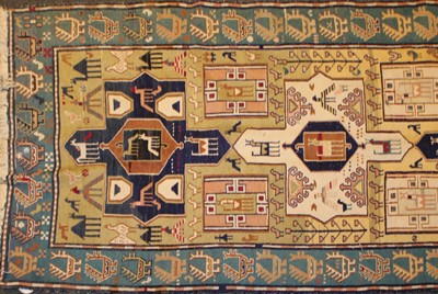 Lot 595 - A hand knotted Caucasian runner