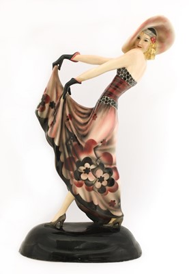 Lot 199 - A Goldscheider pottery figure of a lady in a hat