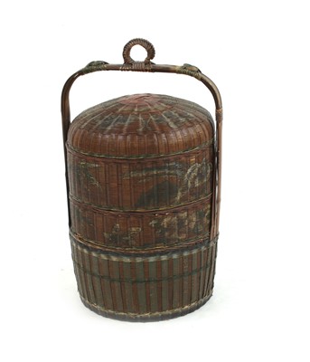 Lot 282 - A Chinese cylindrical multi layer rice box with loop handle
