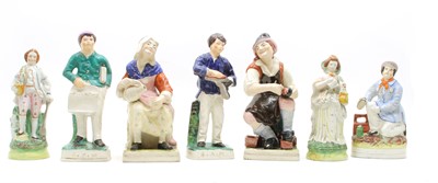 Lot 314 - A pair of 19th century Staffordshire figures