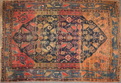 Lot 597 - A hand knotted Persian rug