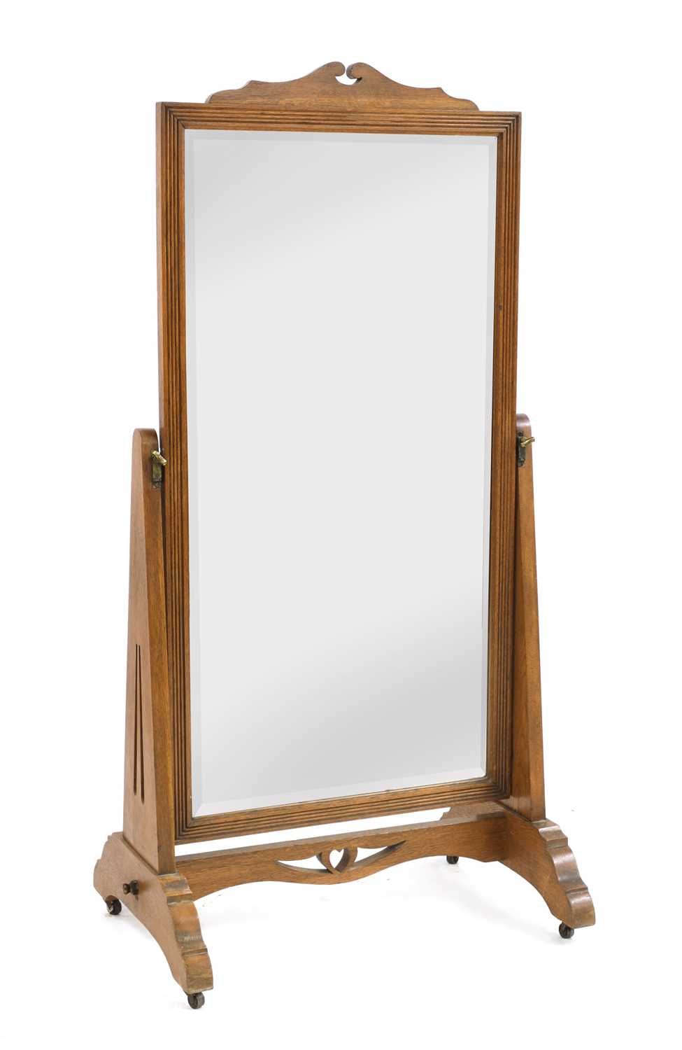 Lot 56 - An Arts and Crafts oak cheval mirror