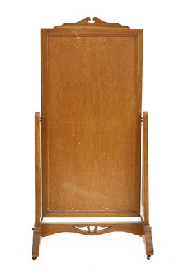 Lot 56 - An Arts and Crafts oak cheval mirror