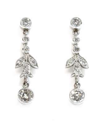 Lot 381 - A pair of platinum diamond drop earrings