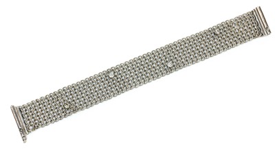 Lot 409 - An 18ct white gold diamond set chain mail bracelet