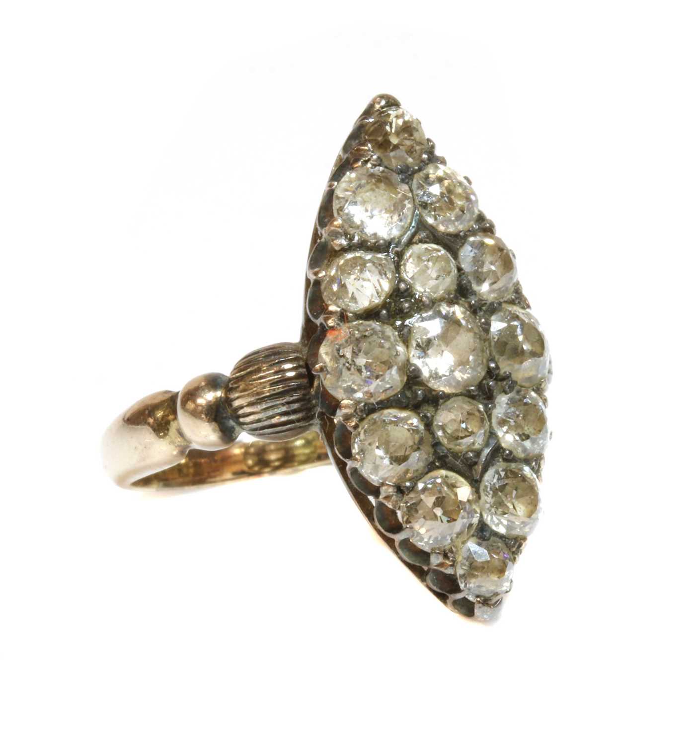 Lot 54 - A late Victorian marquise shaped diamond set cluster ring