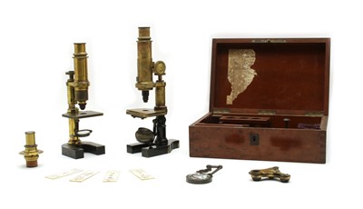 Lot 182 - A 19th century brass monocular microscope by Hartnack and Prazmouski, Rue Bonaparte, Paris
