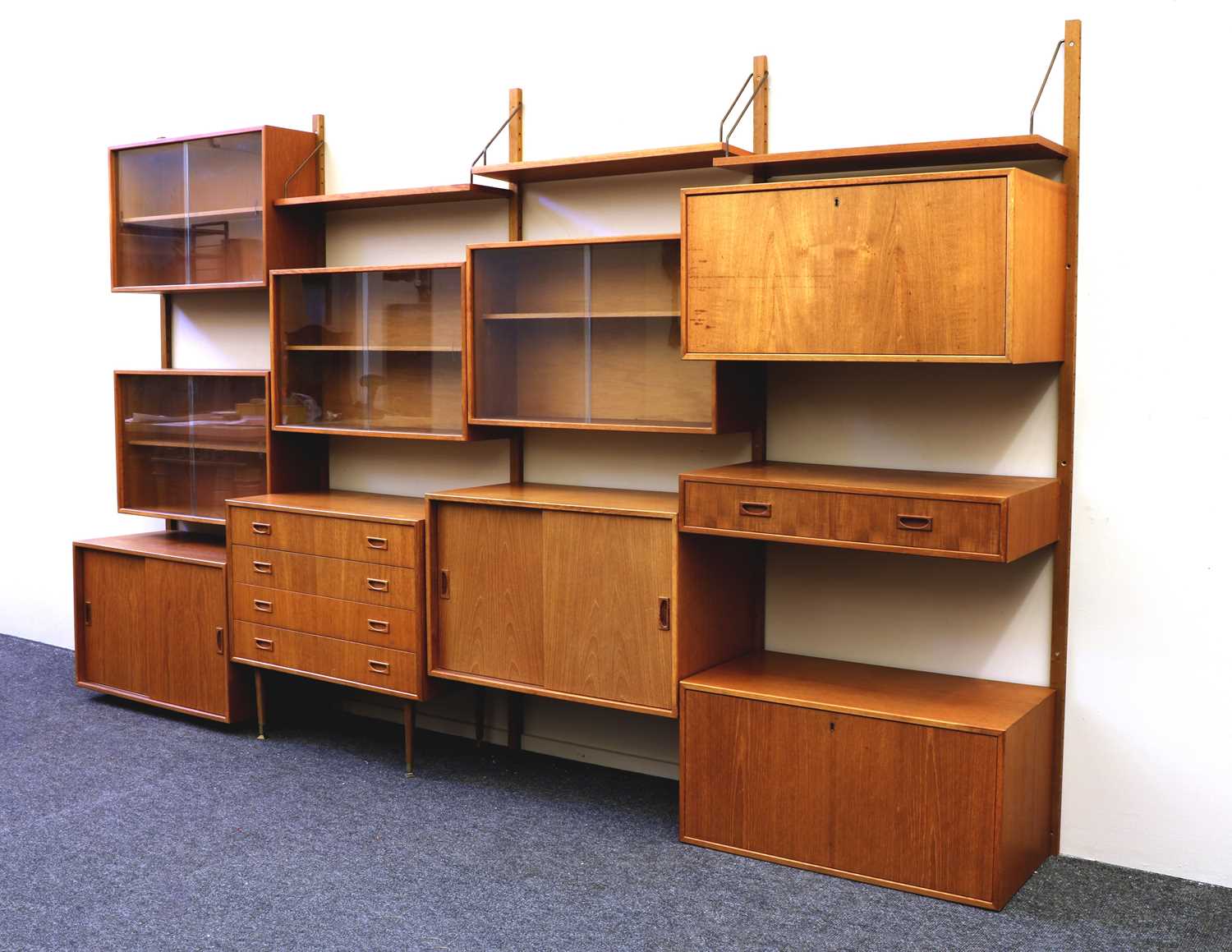 Lot 377 - A Danish teak wall system