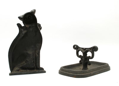 Lot 162 - A Victorian cast iron boot scraper and a Cat door stop (2)