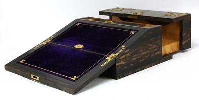 Lot 138 - A Victorian coromandel and brass-mounted writing slope