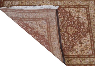 Lot 349 - A fine Persian silk inlaid Tabriz rug