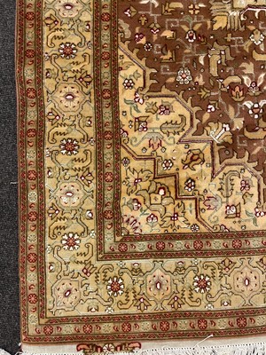 Lot 349 - A fine Persian silk inlaid Tabriz rug