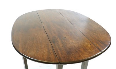 Lot 257 - A mahogany six leg oval dining table