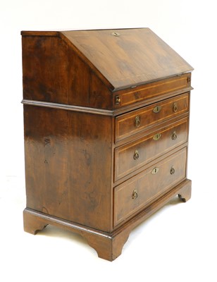 Lot 91 - A yew, crossbanded and feather-banded bureau