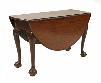 Lot 398 - A mahogany drop-leaf dining table