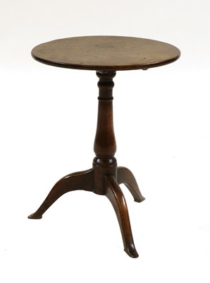Lot 757 - An oak tripod table