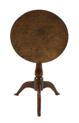 Lot 757 - An oak tripod table