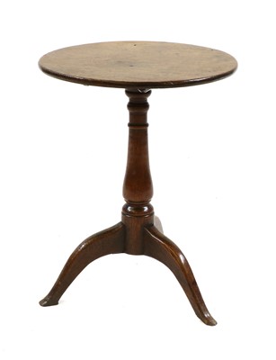 Lot 757 - An oak tripod table