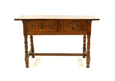 Lot 211 - A 17th century and later pine and fruitwood sidetable