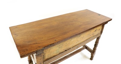 Lot 211 - A 17th century and later pine and fruitwood sidetable